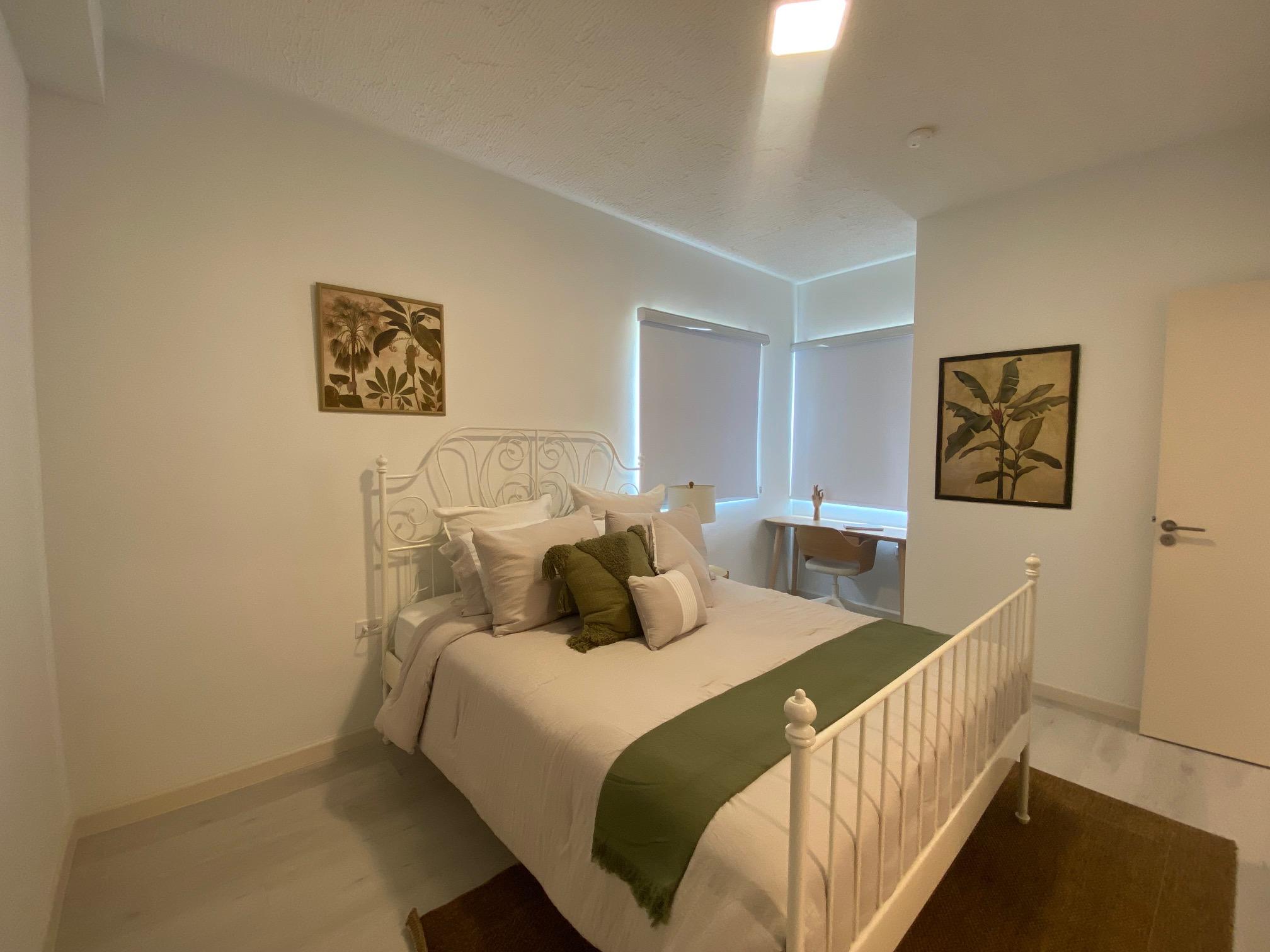 City Heights San Fernando apartment building Trinidad — modern high-rise with parking and scenic views